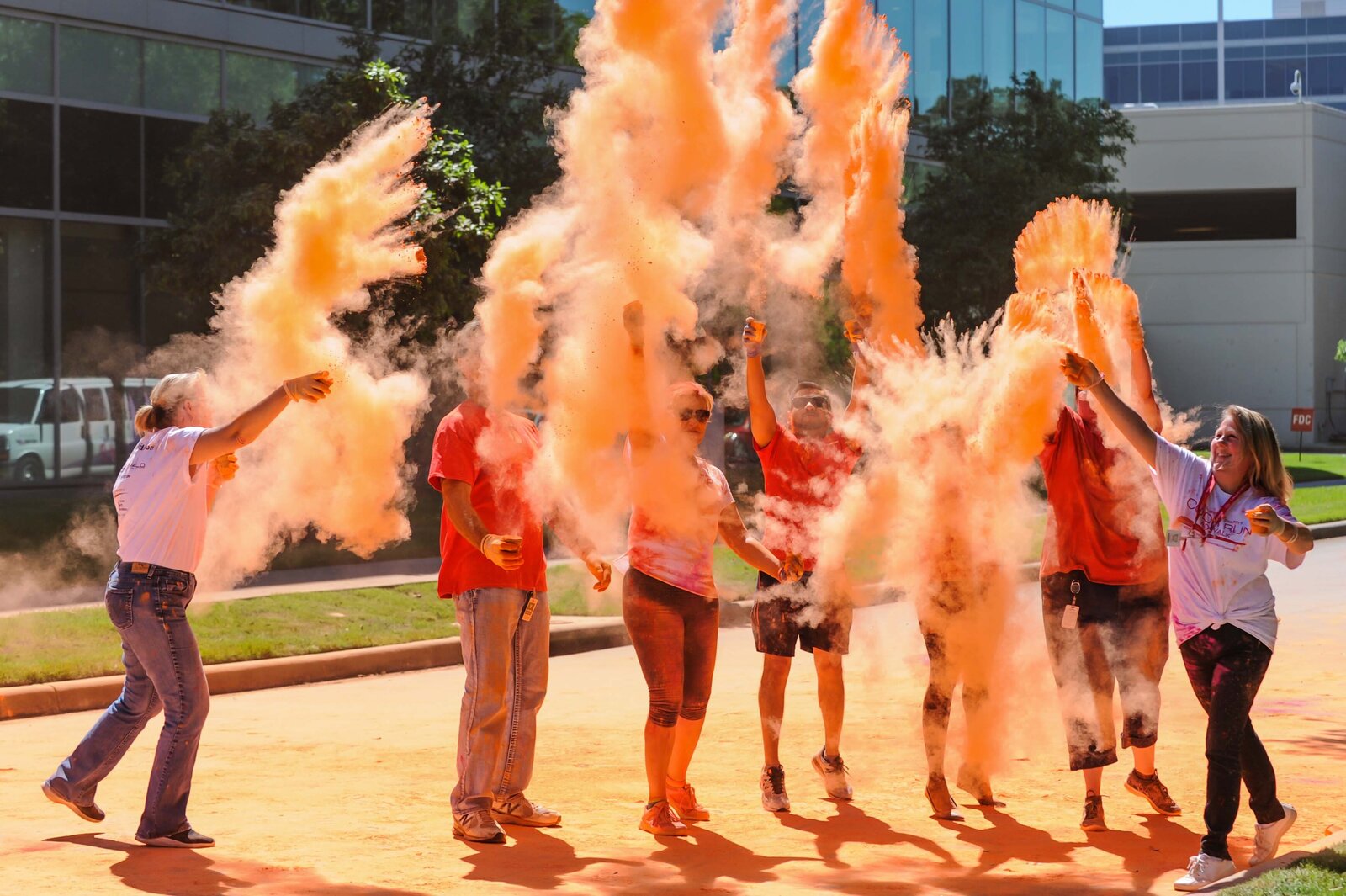 Halliburton employees raise funds for MD Anderson Cancer Center, St. Jude's Children's Research Hospital and Camp Quality during color run event.